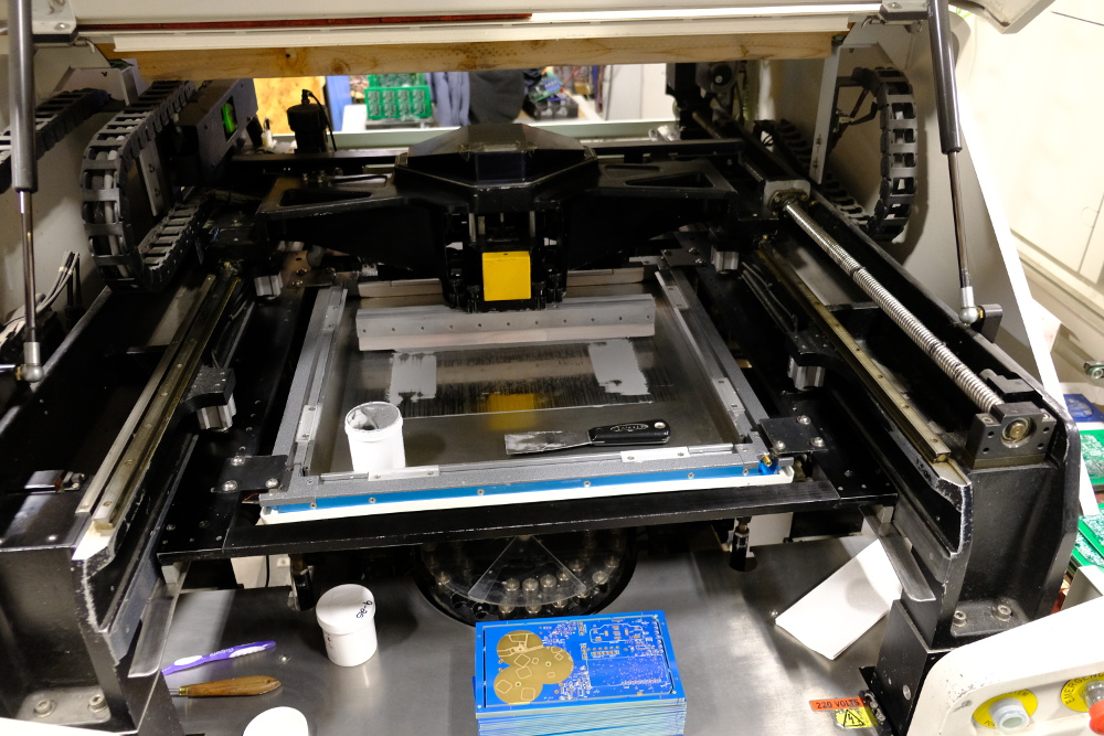 Silk screen machine putting on solder paste.